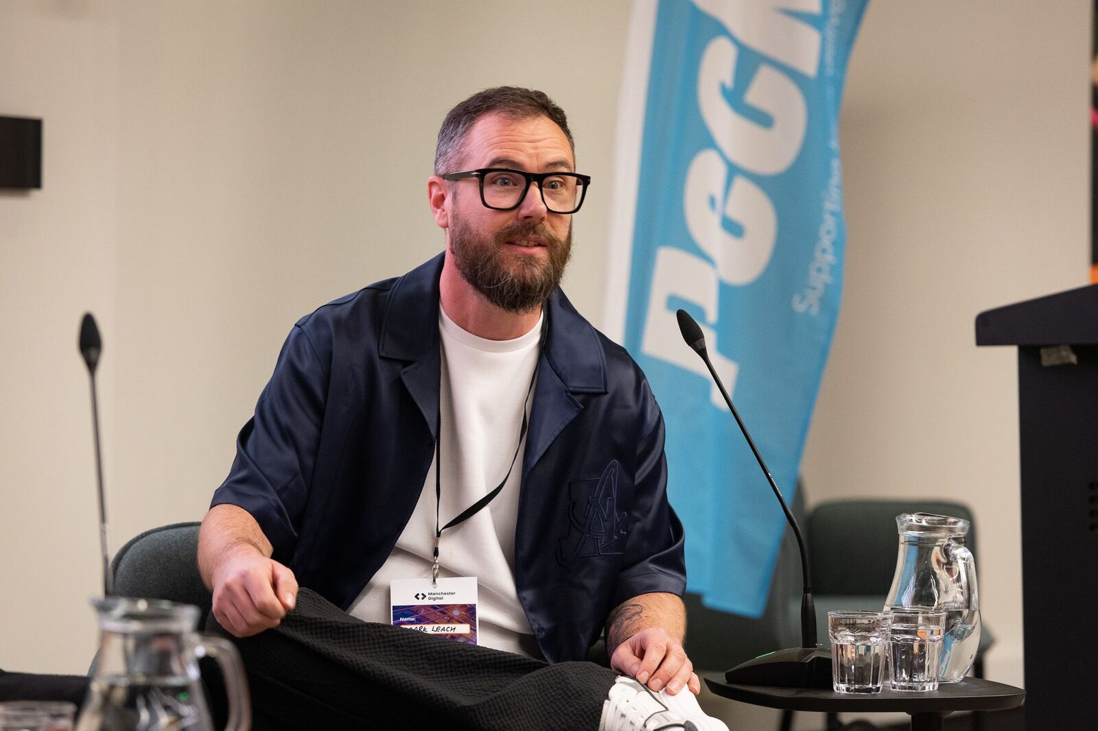 Mark Leach in conversation on a panel